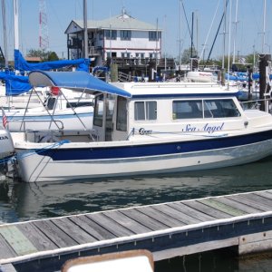 Media 'Sea Angel awaiting departure after a wonderful lunch and fellowship. We ate in the white building in the background.' in album 'SeaAngel and Litl'Tug visit at the 
Sunset Grill, Willoughby Marina which
is VERY friendly with great seafood.'
