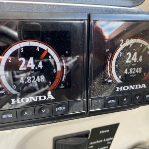 Full fuel tanks, but fairly light otherwise, sure beats the old Honda 40 numbers