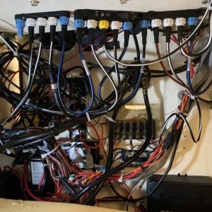 A lot of electrical packed into a small area, so only so much can be done to clean up this rats net. Upper part of photo shows Nmea 2000/seatalk network.
