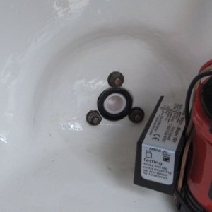 Media 'I bought a second complete drain fitting which gave me a spare plug.  Since it came in black and white, I bought the second one in white and used the white plug.  Figured  maybe it will be easier to look and see the white plug is in place rather than a black one that blends in.' in album 'Old tube, beginning cuts. I made them with a hacksaw blade.'