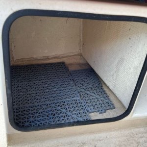 Drainage mats in seat boxes