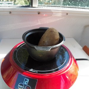 I even tried baking a potato.  Worked great and the outside was brown in some areas.  It took almost an hour with the heat setting at 2 (about 200W) and it didn't even draw the house battery down enough to register on my meter.  The sun was still up, so my solar panel was producing 50W.