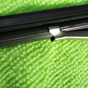 Media 'New rubber and strips fed into the clips' in album 'Old bad wiper blade in holder'