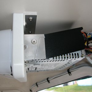 Side view of my mounting system for the Sony unit.  Just a piece of King starboard and piece of aluminum angle.  Works well.