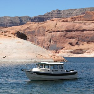 E Z DUZIT does Powell
