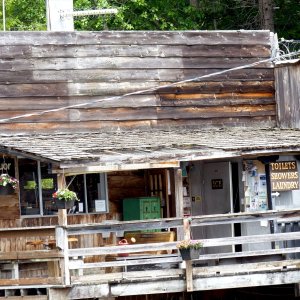 56 Refuge Cove Store. No need to be scared, it does look a bit better inside and they do have a lot of stuff during the main season.
