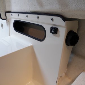 The heater outlet blows mostly into the V berth.  I was hoping that it would be directional enough to point it towards the wind screen, but not quite.  The heater control is easy to turn on, watch, and adjust without leaving the helm (or the V berth in the morning).