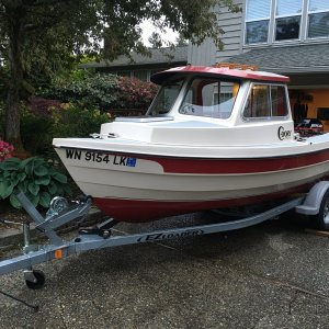 Media 'One of last photos before selling in 2017, but showing the 1990 Angler on a 2013 EZ Loader 14-18 2100 Roller trailer, fitting (just barely) under the 6'11" high garage door opening.' in album 'In ferry line, after purchasing boat in Friday Harbor from orginal owner'