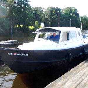 Bruce on RIVER HORSE moored at River's Rest