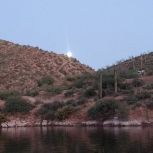 Big fat moon coming over the hill