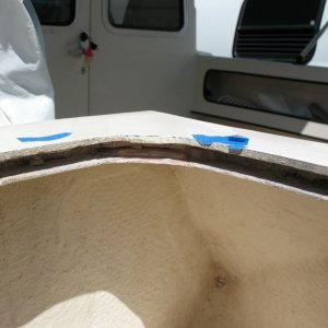 Removing perimeter balsa core, to be replaced with thickened epoxy.