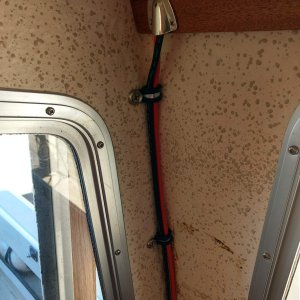 Here are the solar charging wires coming into the port/aft corner of the cabin.