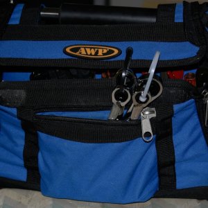 Media 'Boat Tool Bag with Complete Set of Metric and SAE Gear Wrenches tuck into a side pocket and take up minimum space. Each pair is bundled with 8 inch tie wraps in an unlocked configuration for quick identification. White is Metric, Black is SAE.' in album 'Complete set of most used SAE and Metric Sizes in just 4 box wrenches. These handy reversible wrenches are made by Gear Wrench sold at Lowes, Sears, etc.'