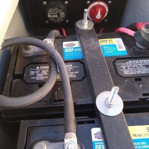 It was a tight fit but happy with the result. This is the starboard rear transom hatch. I build a fiberglass bracket to install the Blue Sea battery combiner and on off switch