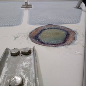 I glassed both sides of 3/4? piece of plywood core to fill hole. Once faired it was finished with a krylon paint job. High build primer filled by antique white top coat. Close enough.