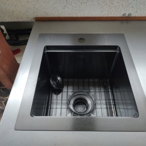 Installed deep Bar sink with Flush mount cutting board.