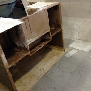 Redesigned splash well fits into original tabs. A fair amount of work to clean out all the old wood and fiberglass in the channels
