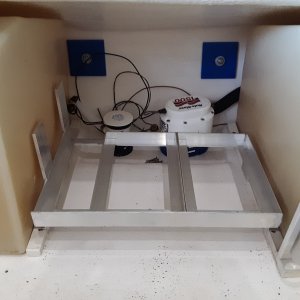 batteries and diesel tank mounts between the gas tanks