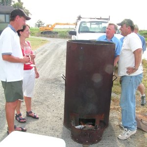 "The Smoker/Cooker"
Sam & Kerry (Salty C's), Jim (Pounder) and John (Dinner Belle II) looking on.