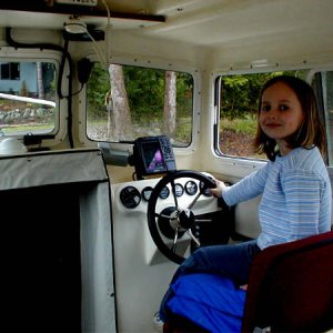 Anna at the helm of the Anna Leigh