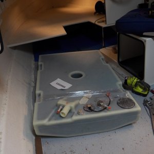 Media 'I thought that it might fit by just removing one of the supports for the V berth.  Nope, they both have to come out.  That's okay as it turns out that they are also just screwed directly into the balsa core.' in album 'I bought a 23 gal. tank from overstock.com for $140.  It was made by Moeller and used on Lund boats.  In 2011, boat manufacturers were required to install low permeable tanks when they ran out of their older stock. Low permeable tanks have a black nylon lining (as can be seen here).  There are still a lot of older style permiable tanks being sold even though they are new old stock and unused. BoatUS did an experiment where they found that an old style 6 gallon plastic outboard tank lost almost a pint in 6 months.  That's why gas goes bad.'