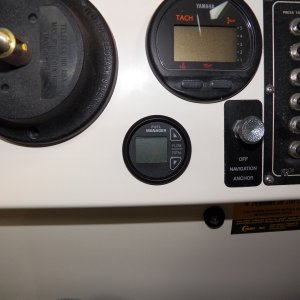 Here is the fuel management system gauge installed.  Directions said to keep it at least 20" from the radio.  I don't know which interferes with which, but it meant moving the radio.