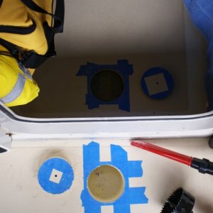 Inspection Plates - Cabin sole just forward of door (in upper portion of picture). Cockpit sole just aft of door (in lower portion of picture).  No water present under cockpit sole.