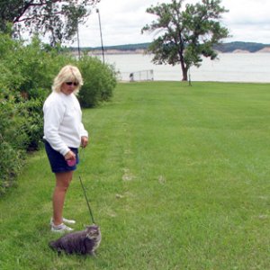 Off the boat, walking Molly the cat
