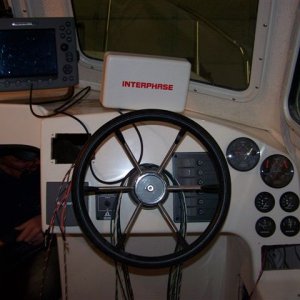 (Cygnet) t.l. nav lights  b.l.auto p/winch  t.r. fuel consump/rpm  many more switches extreme lower right