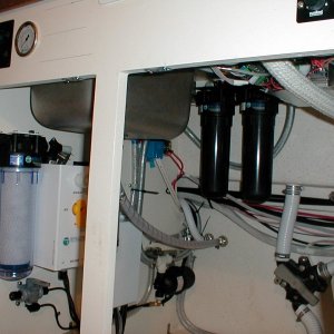 (Bob Cat) watermaker stuff neatly under sink