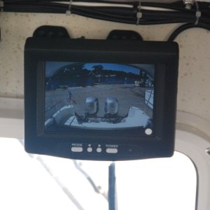 AFTER  getting the original monitor wet from spray thru the center windshield,(I left the protective plactic cover off)it was time to move it to a drier location to the right of the C80's Alphanumeric Keypad -above the windshield.
The replacement came from 'RVCams.com'.