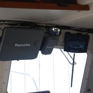 This relocation will save me from another $184.00 plus S/H bill.  This location makes it much easier to scan my situation and to juggle the twin throttles while backing into the slips. The camera has all but eliminated the blind spot behind helm caused by the head's particians. This also has improved my scanning efficiency.