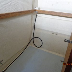 Front of this storage removed. Walls & floor washed with bleach. Now ready to install a shelf.