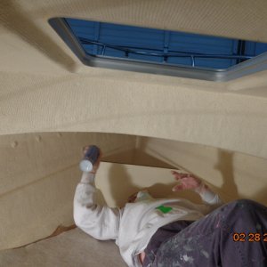 Not a lot of room - and old paint pants are absolutely necessary!