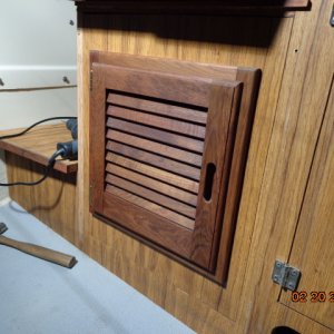 Louvered door installed in the storage area under the helm seat. Finally done with these doors!
