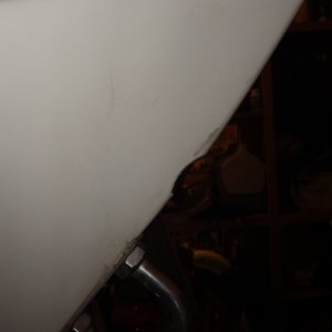 "Divot" from bow roller