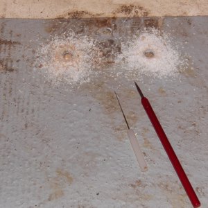 Some of the screws had corroded and that colored the swarf.  Spooked me, so I got out my creepy medical tools.
