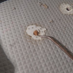 Moving on to other deck penetrations, these are the holes that hold the helm bulkhead in place.  They didn't appear to have leaked, but the pulpit mounts forward had leaked and the core was saturated.