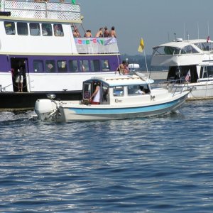 (Norm S) 89 22 Cruiser on logboom patrol at Seafair