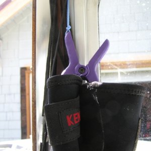 Cheap little spring clips from Home Depot  hold gloves / hats etc