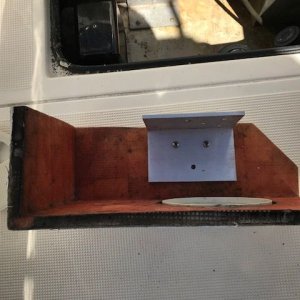Alum bracket holding it to the side of the cockpit.