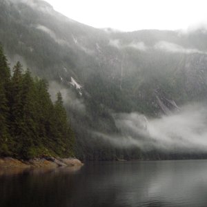 RAIN and lots of it, low clouds, and lots of waterfalls around the rock walls.