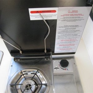 Butane Stove.works great...found butane canesters for 70cents each in Oakland chinatown
