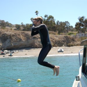 #1 hitting the water at the Isthmus.  Turns out the pilot house is a great jumping platform.  Who knew?
