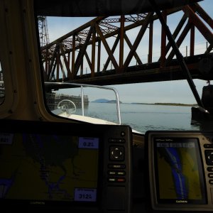 Heading out Saturday morning under a closed bridge at low tide.