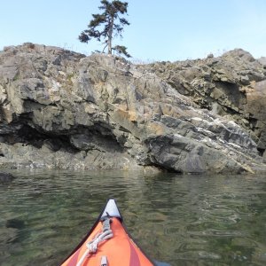 Exploring the various rock formations on the outside of Watmough bay