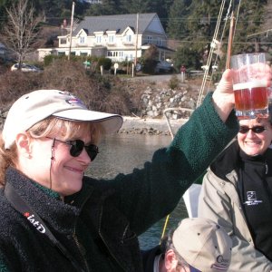 Jo toasting the new name of "her" new boat Spirit.
