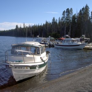Farwest 111 to shore the rest docked at Eagle Bay dock