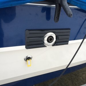 Guard I fabricated out of a nylon like plastic to protect the exhaust port from dockings.