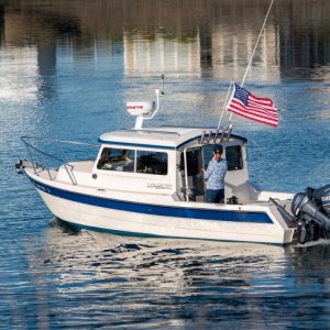 Media 'Another photo from my personal photographer.' in album 'First fish on the boat and new name.'
